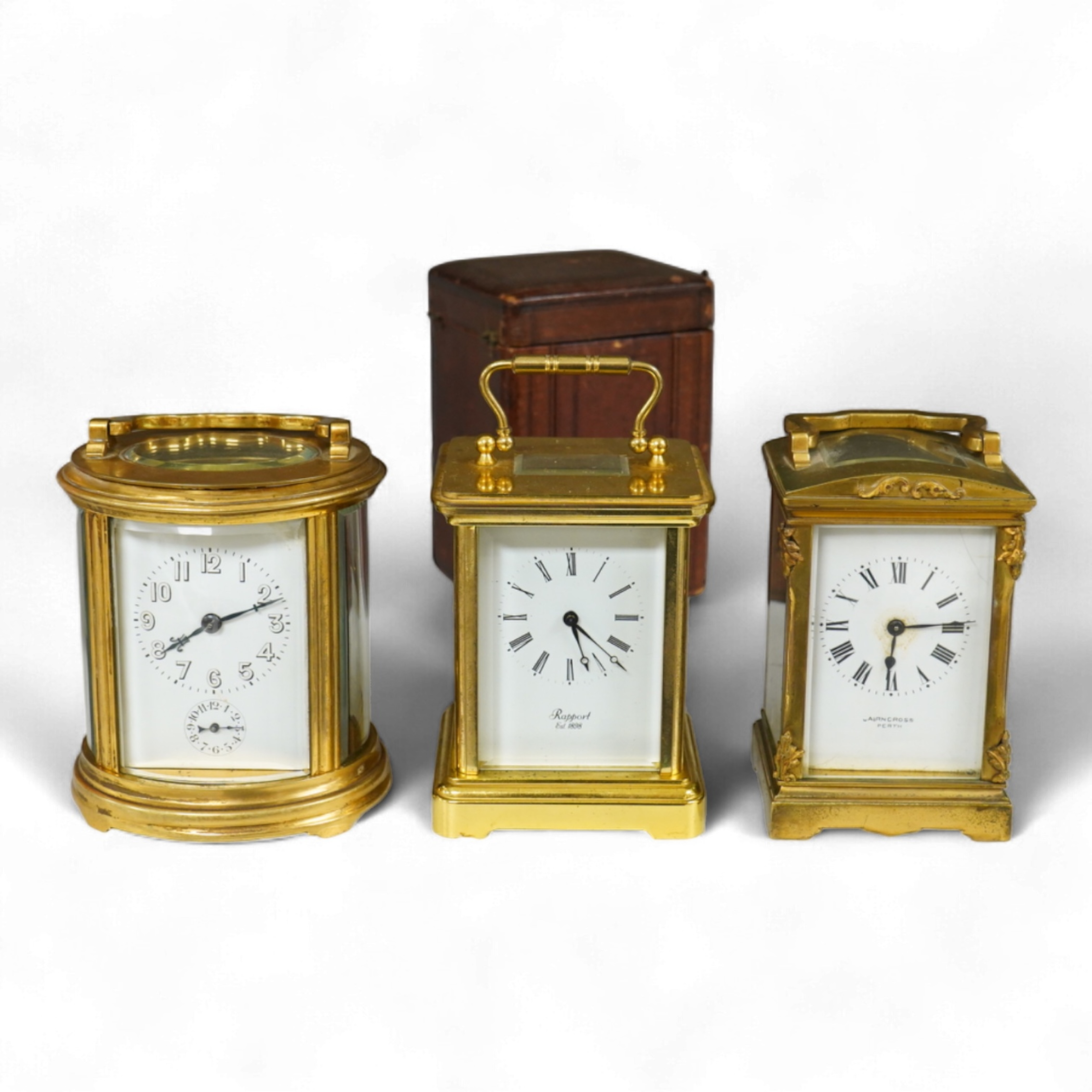 Two carriage clocks and a timepiece, tallest 12.5cm